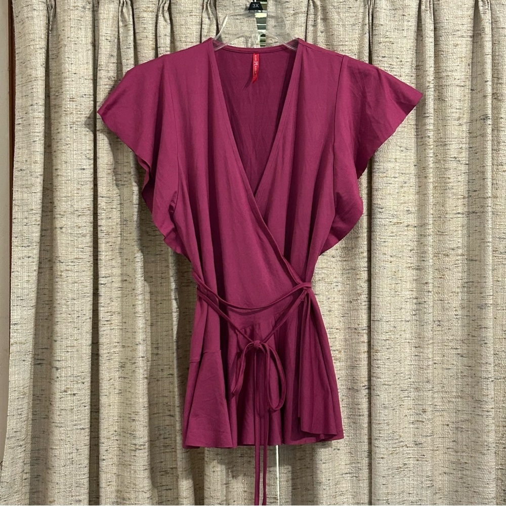 Ruby Ribbon Swing Wrap Top